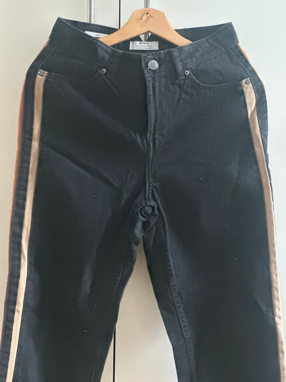Pantalones negros rayas cafés